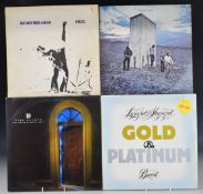 A collection of 40 albums including The Rolling Stones, Bad Company, Dire Straits, Peter Frampton,