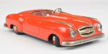 JNF Condor clockwork sports car with red body, brown interior and silver grille & bumpers.