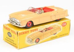 Dinky Toys diecast model Packard Convertible with tan body, red interior, grey driver, silver trim