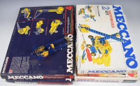 Four Meccano construction sets comprising numbers 2,3,4 and Meccanoids, all in original boxes.
