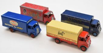 Four Dinky Toys diecast model Guy delvery trucks comprising Ever Ready, Lyons, Spratts and