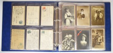 An album of approximately 150 early German postcards including humorous, sentimental, animals and