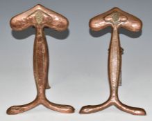 Pair of copper Art Nouveau or Arts and Crafts fire dogs, height 31cm