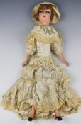 Boudoir or similar doll, likely 1920's with composite head and limbs, height 70cm.