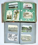 Two large Edwardian postcard albums of topographical, humorous, military and transport including