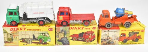Three Dinky diecast model trucks comprising Bedford TK Coal Lorry 425, Lorry-Mounted Concrete