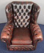 Red leather Chesterfield armchair