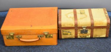 Early to mid 20thC novelty miniature leather bound travelling trunk or workbox with railway labels