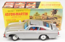 Gilbert (Japan) James Bond Aston-Martin DB5 battery operated tinplate car with light, sound and