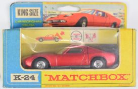 Matchbox King Size diecast model Lamborghini Miura with metallic red body, cream interior and silver