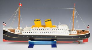 Tucher & Walther tinplate SS Bremen with clockwork motor, T303, in original box with certificate.