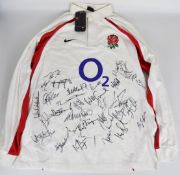 2002 Nike England International Rugby shirt, signed by the entire team, unworn with tag, size XL