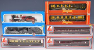 A small collection of 00 gauge model railway locomotives and carriages together with a single H0