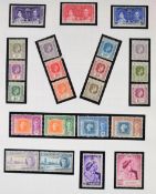 A collection of mint GB Commonwealth stamps in two blue 'Collecta' stamp albums, from George VI to