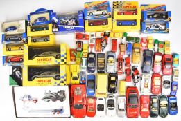 A collection of loose and boxed diecast model cars to include Maisto, Burago, Heritage and