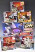 A collection of Star Wars Micro Machines playsets by Galoob to include Death Star, Millenium Falcon,