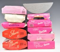 Eleven Mattel Barbie dolls including Pinstripe Power 19791, Wedding Day 17120, Happy Holidays