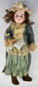 Victorian bisque head doll marked DEP 8 to back of head, with fixed blue glass eyes, open mouth,