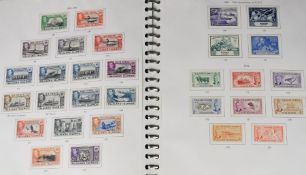 A large mostly mint GB Commonwealth stamp collection in various albums from George VI to Queen