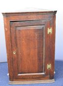 19thC oak corner cupboard with two shelves within, W64 x H98cm
