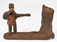 19thC style novelty cast iron 'banker' moneybox, with hinged hand to place the coins in his pocket