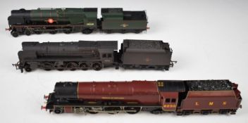 Three Hornby 00 gauge model railway locomotives comprising Merchant Navy, weathered 9F and Duchess