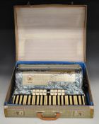 Marinucci 120 bass piano accordion with blue marbled finish, in fitted case