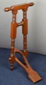 Edwardian mahogany folding / campaign boot jack with inlaid brass plaque for 1911, height 87cm