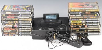 Sega Saturn retro video game console with controller, power supply and 22 games to include Die