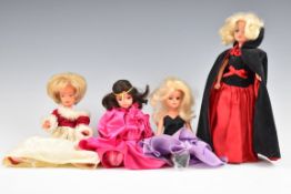Four vintage Sindy dolls with outfits comprising Emanuel Scarlet Lady, High Society, Misty Mauve and