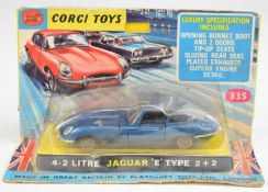 Corgi Toys diecast model 4.2 Litre Jaguar 'E' Type 2+2 car with dark blue body, black interior and