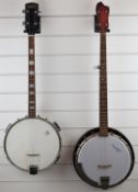 Raven four string banjo, length 89cm, and a five string banjo marked 'made in GDR', length 98cm