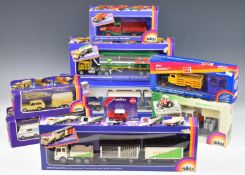 Nine Siku diecast model trucks and cars to include Kenworth Semi Tanker BP 3418 and Camper with