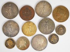 Twelve French medallions and coins to include Mademoiselle A. Masson 1903, 1904 and two 1905 drawing