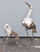 Two metal garden sculptures of birds, height of larger 92cm