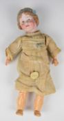 Revalo bisque headed doll with composite limbs, moulded hair, grey intaglio eyes, smiling mouth