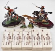 A collection of nine Chas.C.Stadden Studios miltary figures with painted and unpainted examples to