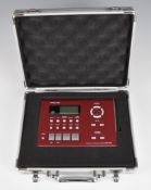 Tascam CD-GT2 portable electric guitar trainer, in flight style carry case