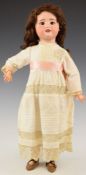 Early 20th century bisque headed doll marked SFBJ 60 Paris to neck, with open mouth, brown