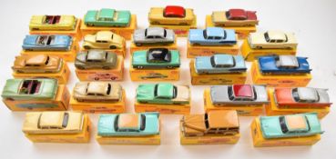 Twenty three Dinky Toys diecast model cars comprising numbers 131 x2, 132, 148, 158, 159, 164 x2,
