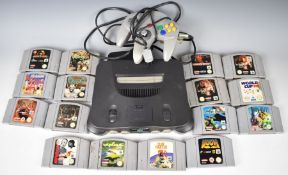 Nintendo N64 retro video game console with power supply, controller and 16 games including War Gods,