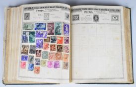 The Empire and The Britannia stamp albums along with a green folder containing a mint and used GB