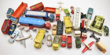A collection of loose Corgi and Dinky diecast model vehicles to include James Bond Aston Martin DB5,