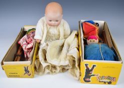 Two Pelham Puppets comprising Rod Hull's Emu and Heidi together with a bisque headed doll stamped AM