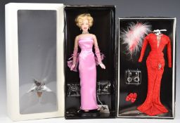 Franklin Mint Marilyn Monroe portrait doll in original box with stand, together with a Gentlemen
