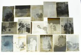 Approximately 140 glass plate negatives, appearing to depict family life and a new child including