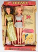Two Palitoy Tressy dolls including key, stand, rollers and an original box.