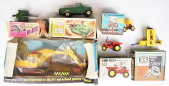 A small collection of vintage Britains diecast farm and military vehicles including Battalion Anti