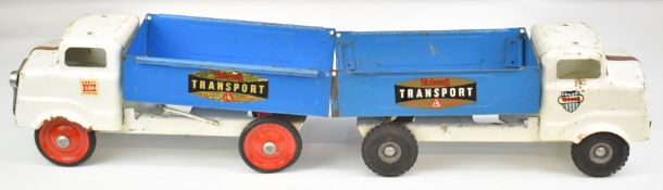 Two Tri-ang pressed steel model tipper trucks both with white cab, blue bed and red hubs, one with