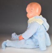 Armand Marseilles composition doll with blue weighted eyes, open mouth, blushing cheeks and padded